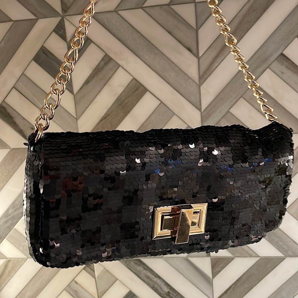 Brand new H&M sequin clutch, perfect for a night on the town.